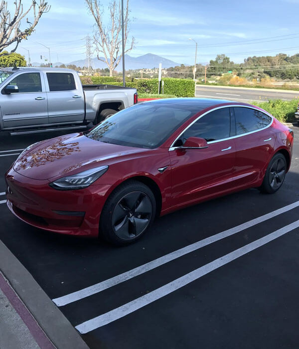 window tint on red Tesla EV
