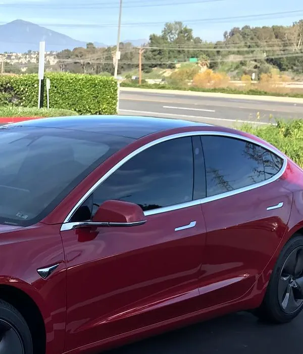 window tint on red Tesla EV